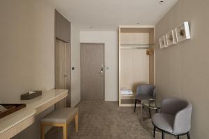 Χώρος καθιστικού στο Gamalan Breeze Hotel