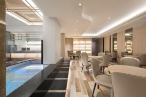 Χώρος καθιστικού στο Gamalan Breeze Hotel