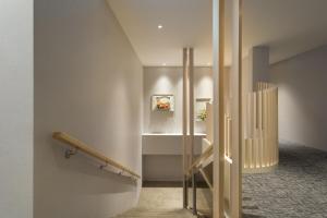 Ένα ή περισσότερα κρεβάτια σε δωμάτιο στο Gamalan Breeze Hotel