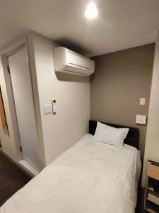 Postelja oz. postelje v sobi nastanitve FLY CAT HOTEL