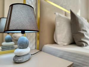 Postel nebo postele na pokoji v ubytování Santa Villa Hotel
