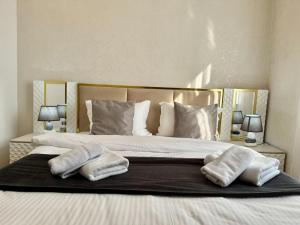 Postel nebo postele na pokoji v ubytování Santa Villa Hotel