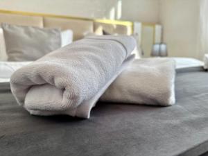 Postel nebo postele na pokoji v ubytování Santa Villa Hotel