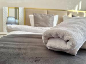 Postel nebo postele na pokoji v ubytování Santa Villa Hotel