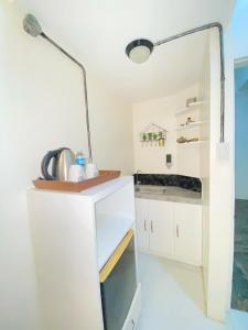 O bucătărie sau chicinetă la Red Angel Hotel by Our story