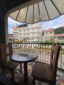 Un balcon sau o terasă la Red Angel Hotel by Our story