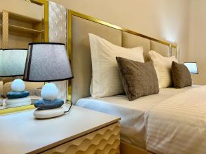 Postel nebo postele na pokoji v ubytování Santa Villa Hotel