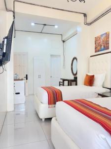 O bucătărie sau chicinetă la Red Angel Hotel by Our story