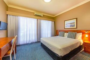 Postel nebo postele na pokoji v ubytování Quality Inn Penrith Sydney + 46 fotografií