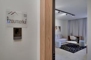 a view of a room with a living room at Nomads Lux Studios & Business Center in Ioannina