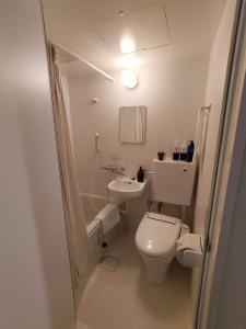 Ванна кімната в FLYCAT INN 伊勢
