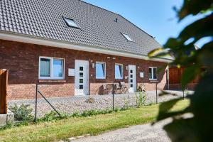 Budova, kde se apartmán nachází + 1 fotografie