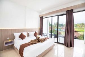 Katil atau katil-katil dalam bilik di Pondok Tetebatu Cottages and Cafe