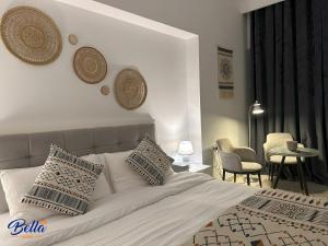 Postel nebo postele na pokoji v ubytování Bella INN - Deluxe Master rooms with Balcony - No Smoking + 17 fotografií