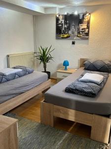 Una cama o camas en una habitación de Ostermanns Apartment