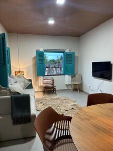 TV a/nebo společenská místnost v ubytování Maison Plage Atins + 9 fotografií