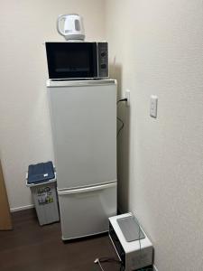 TV in/ali zabaviščno središče v nastanitvi 高島市一棟貸切可能貸別荘グループファミリーok 大人数でご利用だとお得連泊がお得BBQ可能自転車無料利用可ペット可 駅徒歩10分