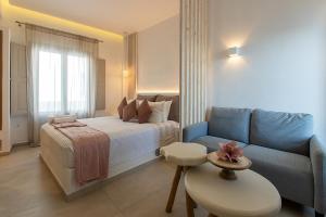 Postel nebo postele na pokoji v ubytování Santorini Garden Homes + 37 fotografií