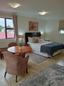 Postel nebo postele na pokoji v ubytování Harmony Place