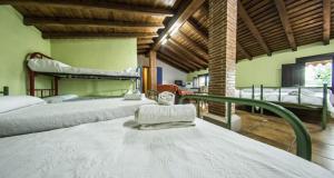 Ένα ή περισσότερα κρεβάτια σε δωμάτιο στο Hotel Rural La Majada