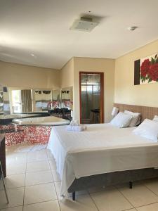 Postel nebo postele na pokoji v ubytování Planeta Hotel