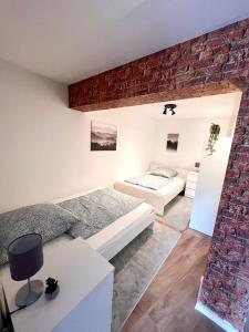 Postel nebo postele na pokoji v ubytování Sehr schönes und möbliertes Apartment