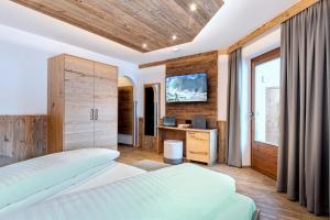 Posteľ alebo postele v izbe v ubytovaní Gäste-Appartementhaus - Urlaubsresort Hafele