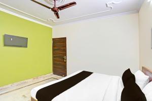 Postel nebo postele na pokoji v ubytování Super Hotel O JPS Lux