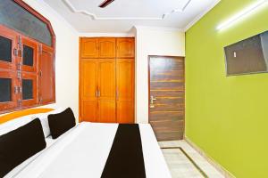 Postel nebo postele na pokoji v ubytování Super Hotel O JPS Lux + 21 fotografií