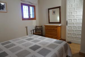 A bed or beds in a room at Casa la Paloma