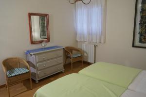 A bed or beds in a room at Casa la Paloma