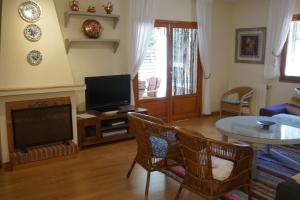 A television and/or entertainment centre at Casa la Paloma