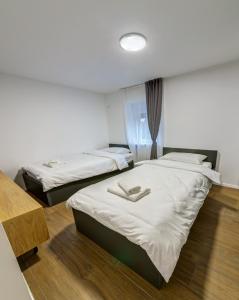 Voodi või voodid majutusasutuse V APARTMENT 4 Futog toas