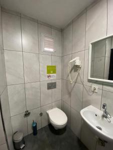 Koupelna v ubytování Nostalji Hotel