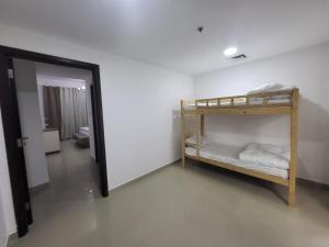 Krevet ili kreveti u jedinici u okviru objekta Ultimate Beachfront Experience