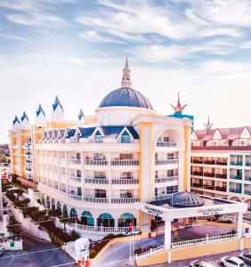 a large building with a dome on top of it at Dream World Resort & Spa in Side