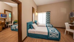 Photo de la galerie de l'établissement Dream World Resort & Spa, à Sidé