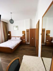 Postel nebo postele na pokoji v ubytování Cabana СUNTU