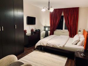 Ένα ή περισσότερα κρεβάτια σε δωμάτιο στο Duplex Maria Unirea
