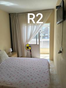 Letto o letti in una camera di guesthouse emaly