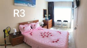 Letto o letti in una camera di guesthouse emaly