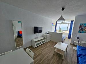 TV a/nebo společenská místnost v ubytování Torre San Francisco Sun & Beach Benalmadena
