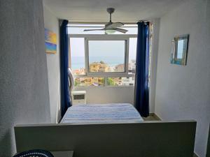 Postel nebo postele na pokoji v ubytování Torre San Francisco Sun & Beach Benalmadena