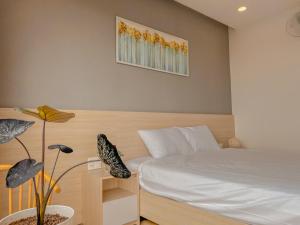 Krevet ili kreveti u jedinici u okviru objekta Lux Nest hotel