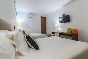 Hotel Soleira客房内的一张或多张床位