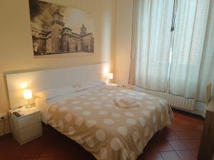Downtown - Camere in Centro客房内的一张或多张床位