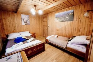Postel nebo postele na pokoji v ubytování Gościniec Kukułka z Jacuzzi + 128 fotografií