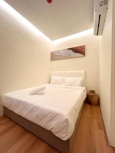 Postel nebo postele na pokoji v ubytování ONE18 Boutique Hotel