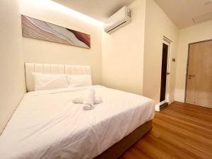 Postel nebo postele na pokoji v ubytování ONE18 Boutique Hotel