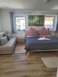 Giường trong phòng chung tại Ferienhaus Gertrud